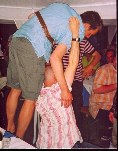 Bob proving that he can lift Apps with one hand.jpg